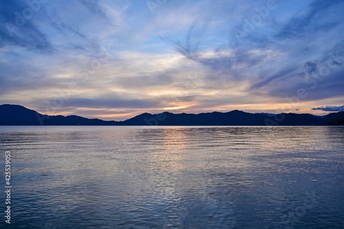 田沢湖と夕焼けのコラボ情景＠秋田