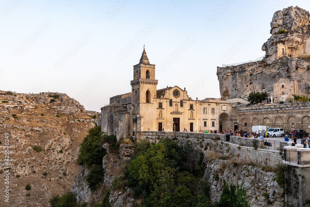  View at Church of San Pietro caveoso and on the top of the hill of Church of Saint Mary of Idris in Matera, Basilicata, Italy