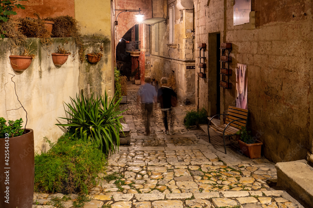 Typical cobbled stairs in a side street alleyway iin the Sassi di Matera a historic district in the city of Matera. Basilicata. Italy