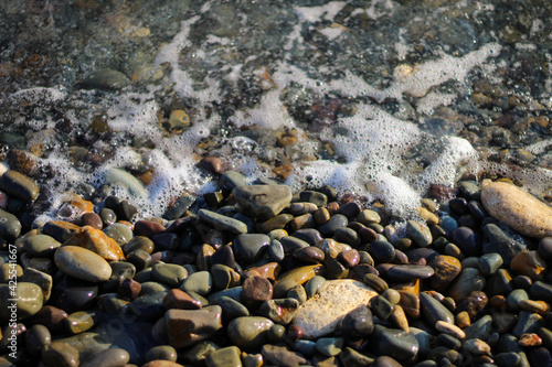 evening white waves on the black sea coast. © Artyomtafgai