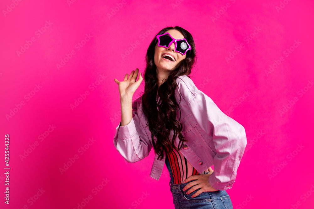 Photo of optimistic brunette nice lady look empty space wear spectacles top jacket isolated on pink color background Photo of optimistic brunette nice lady look empty space wear spectacles top jacket isolated on pink color background