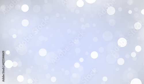 Abstract white bokeh on blue background, background design in sky blue color, sparkles and shimmery background in the shape of a circle.