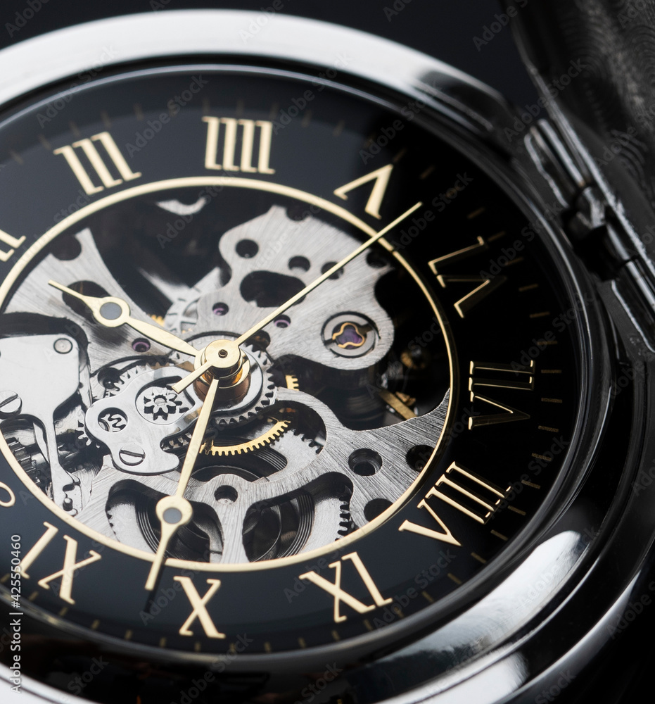Pocket watch clock mechanism shot close-up Pocket watch clock mechanism shot close-up