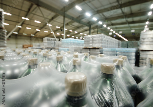 Food industrial warehouse for storage and storage of packagings with drinks,  water,  beer in plastic PET bottles.