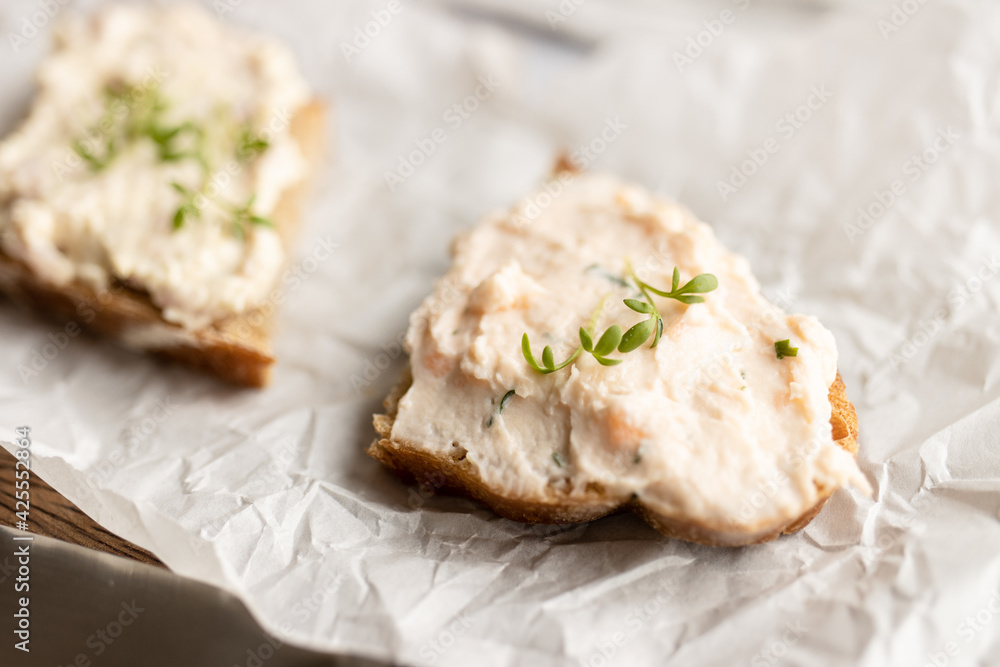 variation of spreads on sourdough rye bread with cress variation of spreads on sourdough rye bread with cress