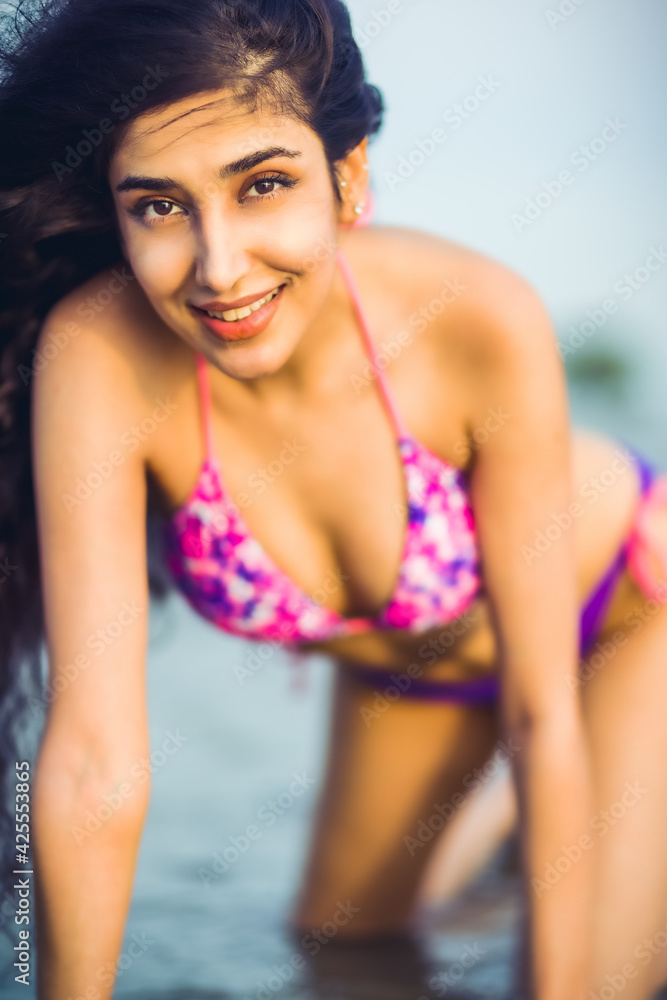 Portrait of a beautiful woman on the beach Portrait of a beautiful woman on the beach