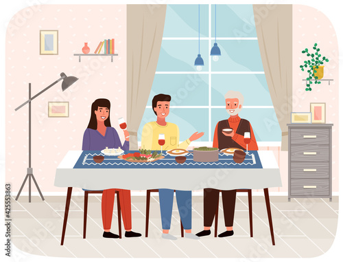 Family members at dining table with khinkali and adjarian khachapuri. People eating georgian food
