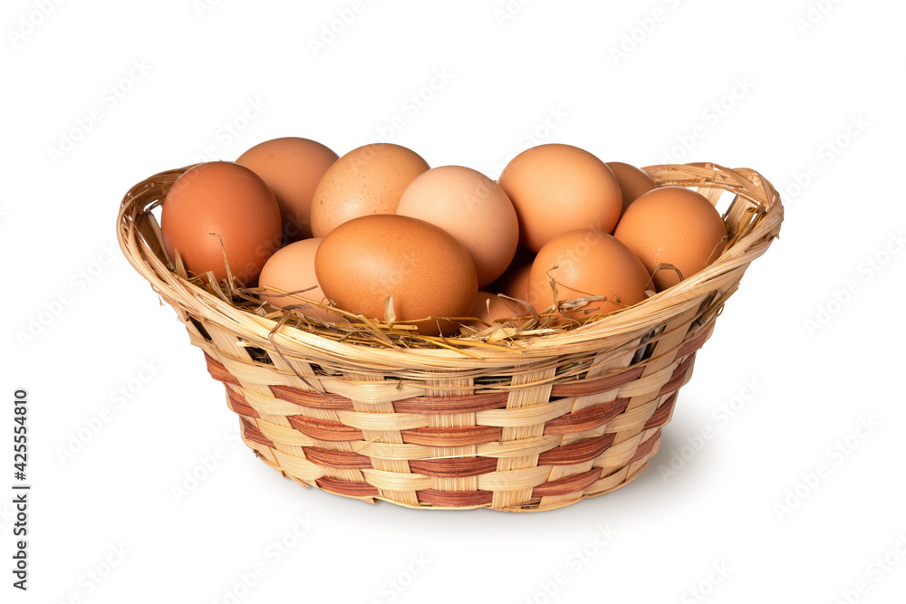 Chicken eggs in basket Isolated on white background. close up Chicken eggs in basket Isolated on white background. close up