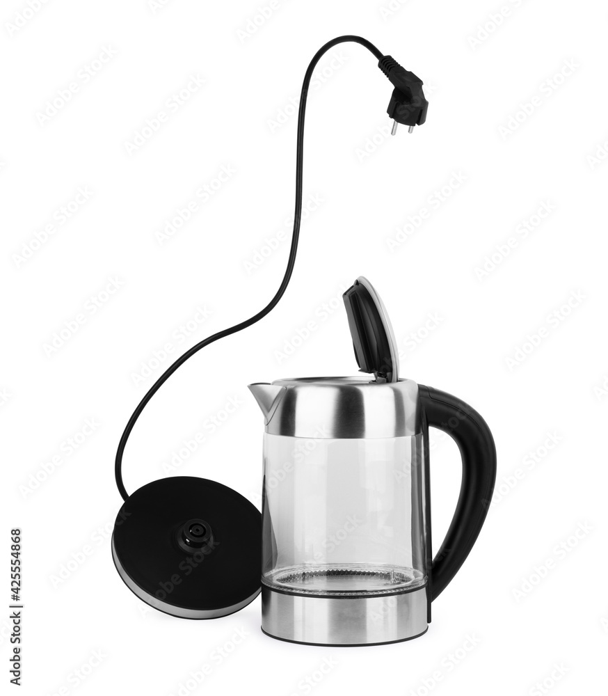Glass transparent kettle on white kitchen table. Closeup. Nobody Glass transparent kettle on white kitchen table. Closeup. Nobody