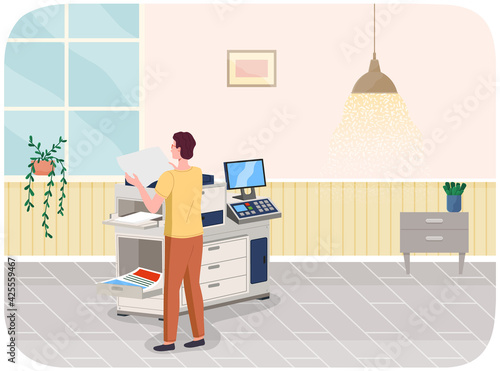 Young professional man working in typography at print to printer. Print house worker use equipment