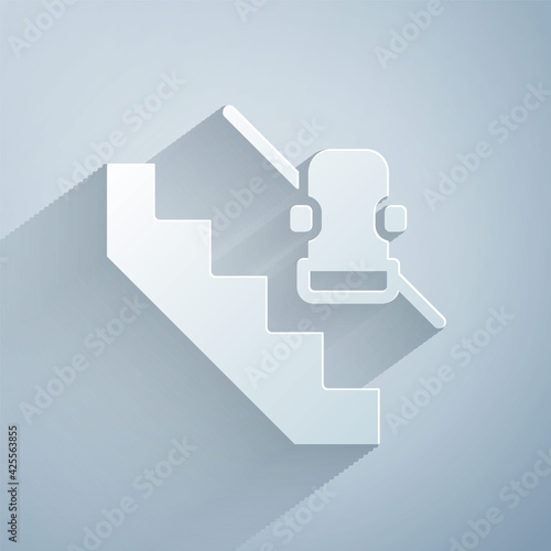 Paper cut Disabled access elevator lift escalator icon isolated on grey background. Movable mechanical chair platform for handicapped human. Paper art style. Vector