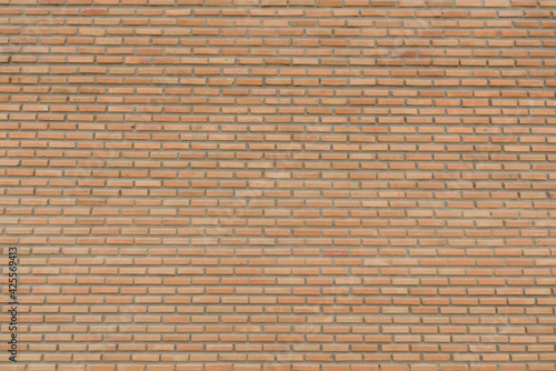 Pattern of brown brick wall for background and textured