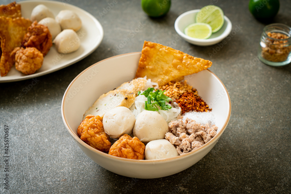 spicy small flat rice noodles with fish balls and shrimp balls without soup spicy small flat rice noodles with fish balls and shrimp balls without soup