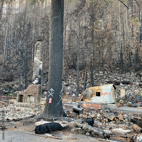 The devastation of a forest fire leaves dream homes in utter ruins. 