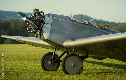 A light airplane from the 1920s in a low cantilever wing and timber construction photo