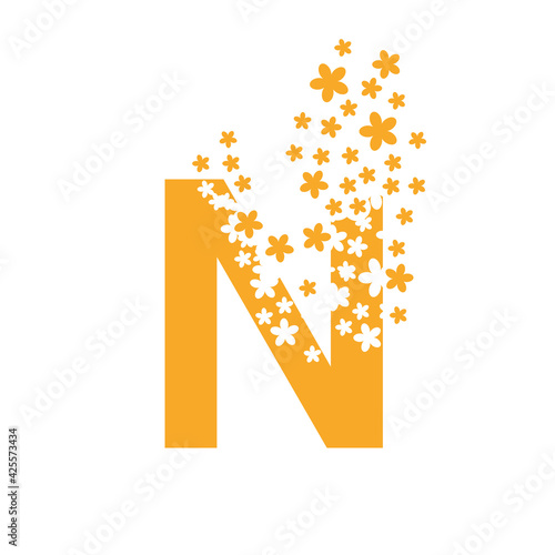 The letter N dissolves into a cloud of flowers