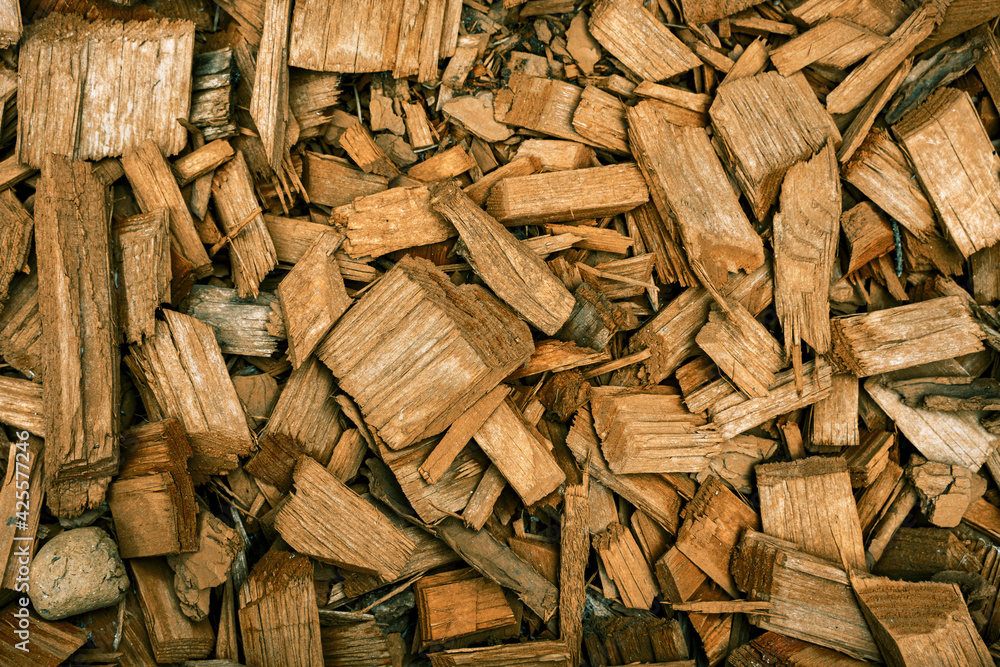 Decoration of flower beds with decorative wood chips and plants