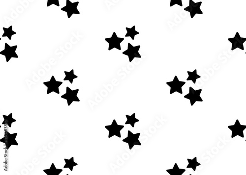 Black stars on a white background. Seamless texture. For wrapping paper, and fabric.