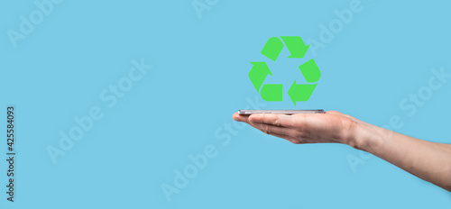 Hand hold recycling icon.Ecology and renewable energy concept.ECO sign, Concept Save green planet. Symbol of environmental protection.Recycling waste.Symbol of earth day, concept of nature protection