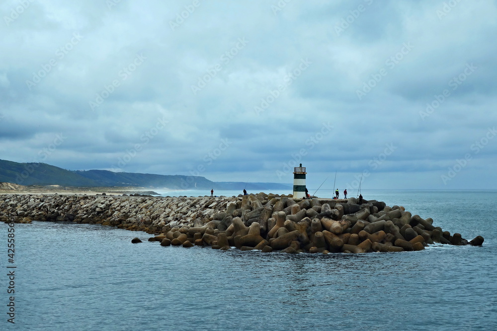 Portugal-view of fisherman and lighthouse near Nazaré town