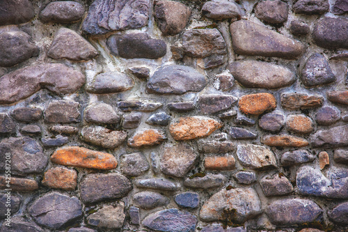 wall of ancient stone after restoration