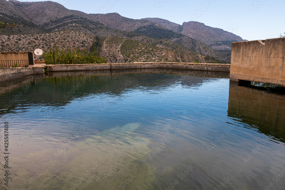 Water basin for irrigation in a Mediterranean mountain.