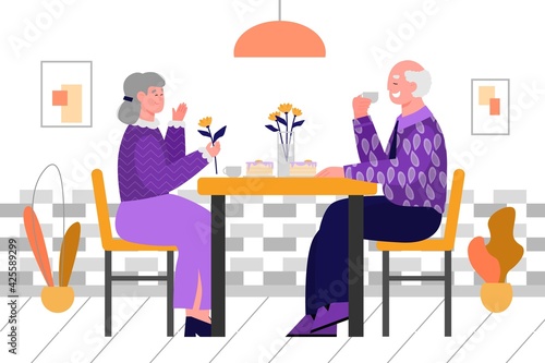 Old couple on lunch date - cute senior man and woman eating dessert