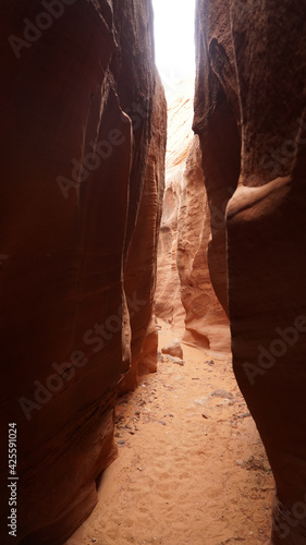 Zebra, Peek-A-Boo and Spooky Slot Canyons exploration in dry arid landscapes near Escalante Town, Utah, USA.