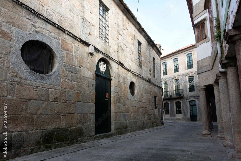 An old street between stone buildings