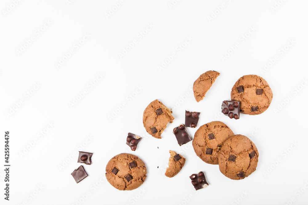 Chocolate broken chip cookies with chocolate pieces. Flat lay Chocolate broken chip cookies with chocolate pieces. Flat lay