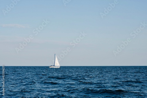 Sailboat on the sea. Sailing on the sea.