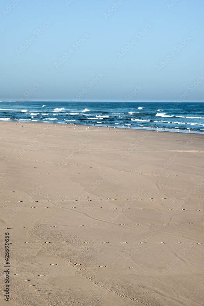 The deserted beach, sky, sea and sand The deserted beach, sky, sea and sand