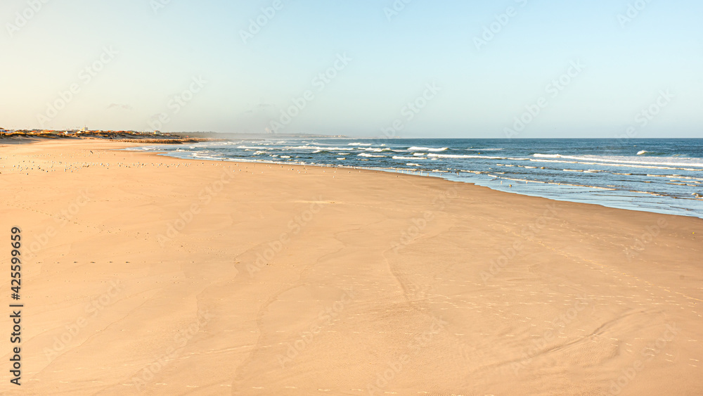 The deserted beach, sky, sea and sand