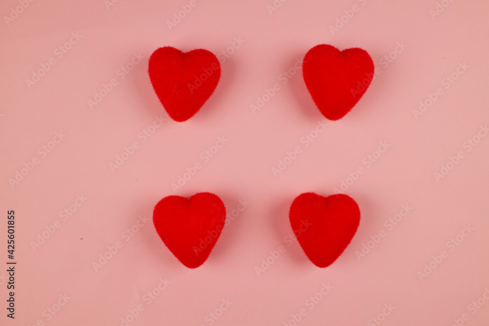 Decorative hearts on a pink background.