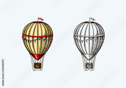 Vintage Hot Air Balloon. Vector retro flying airship with decorative elements. Template transport for Romantic logo. Hand drawn Engraved sketch.