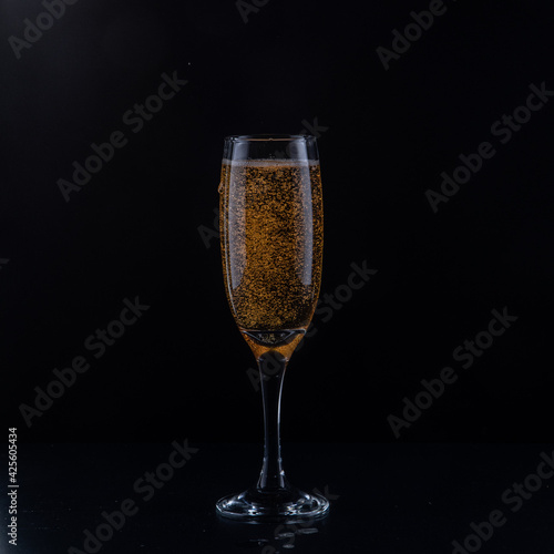 champagne in a flute, bubbles 