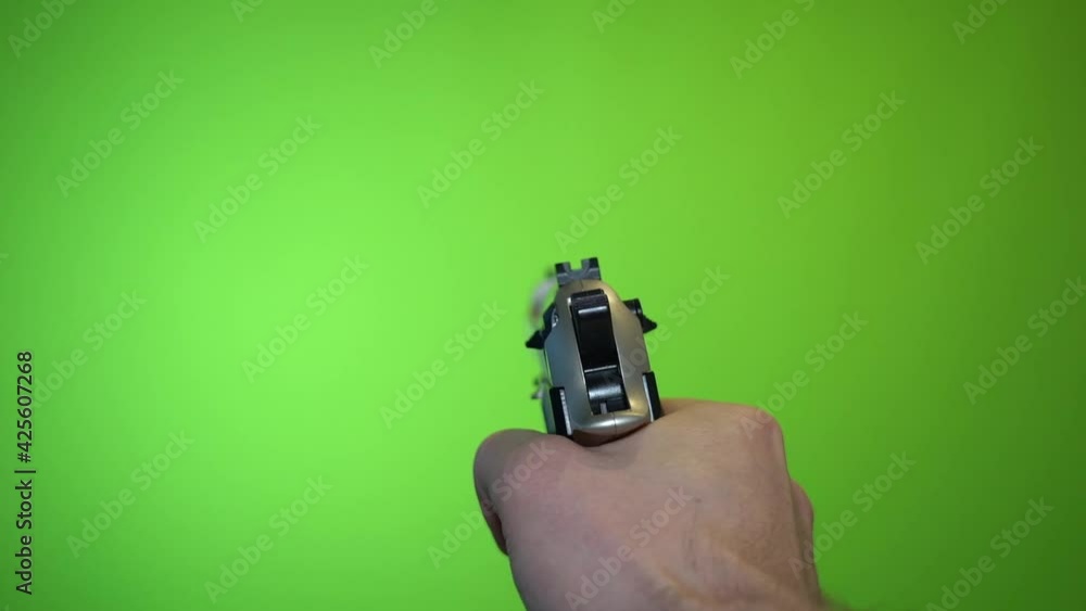 Firing handgun green screen chroma key first person view slow motion Firing handgun green screen chroma key first person view slow motion