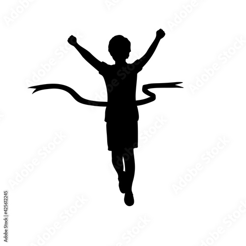 Silhouette boy crosses the finish line.