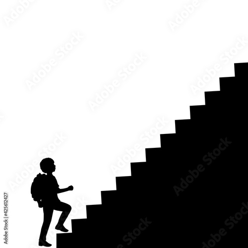 Silhouette school boy with backpack climbs the stairs to the top