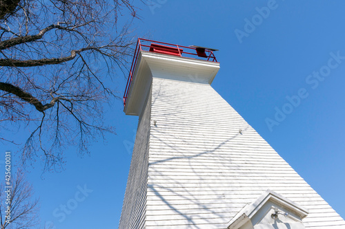 Lighthouse against a blue sky at Niagara on the Lake, Ontario, Canada. photo