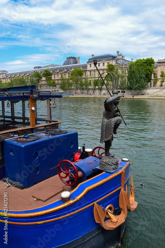 boath for tourists on river Siene,  France photo