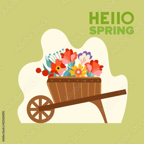 Garden wheelbarrow with flowers hello spring. Vector illustration in flat style.