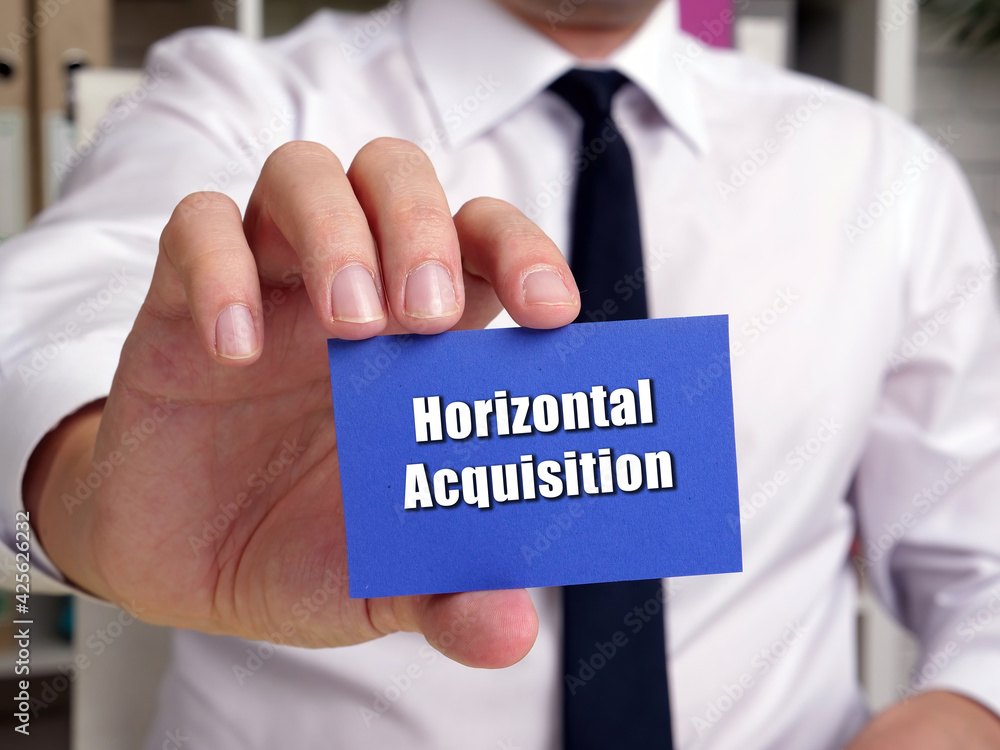 Financial concept meaning Horizontal Acquisition with inscription on the sheet. Financial concept meaning Horizontal Acquisition with inscription on the sheet.