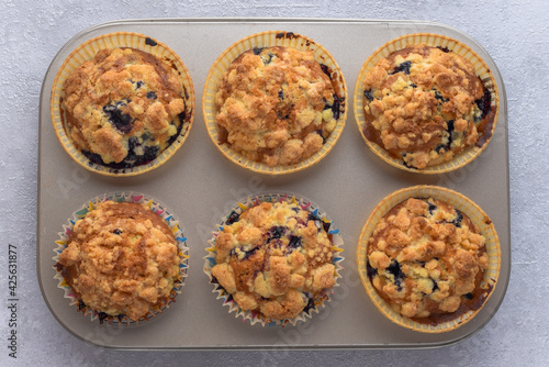 Delicious muffins in baking form