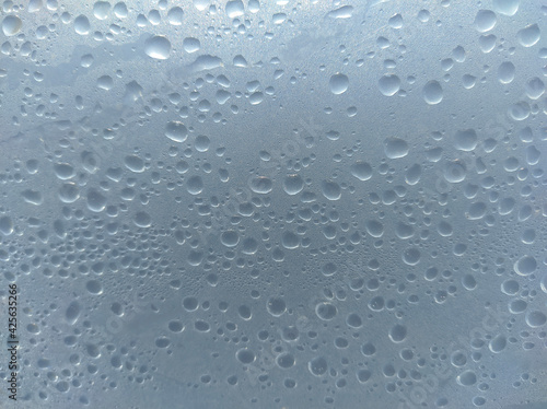 Water droplets on the film.