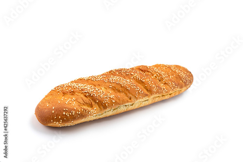 Baguette sprinkled with sesame seeds with an appetizing crust on a white background