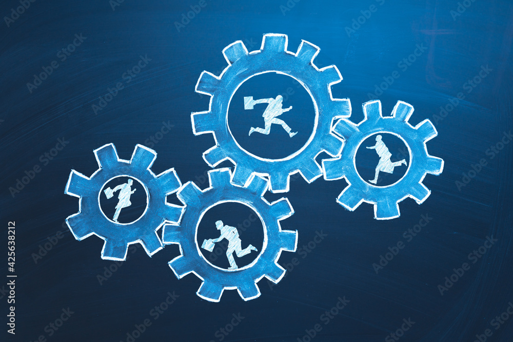 Teamwork business concept. Businessmens running in gears. Idea of partnership, cooperation, team work. Metaphor for joining a partnership as diverse gears connected together as a corporate symbol Teamwork business concept. Businessmens running in gears. Idea of partnership, cooperation, team work. Metaphor for joining a partnership as diverse gears connected together as a corporate symbol