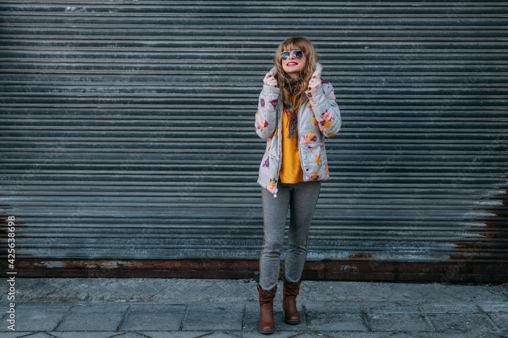 middle-aged adult woman on the street outdoors middle-aged adult woman on the street outdoors