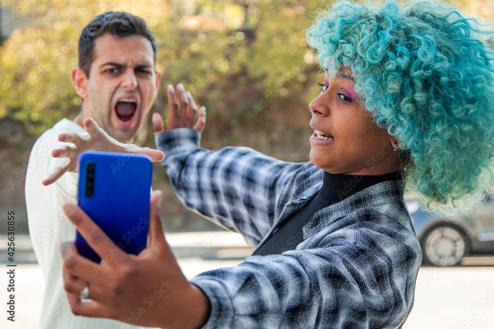 couple fighting over the mobile phone couple fighting over the mobile phone