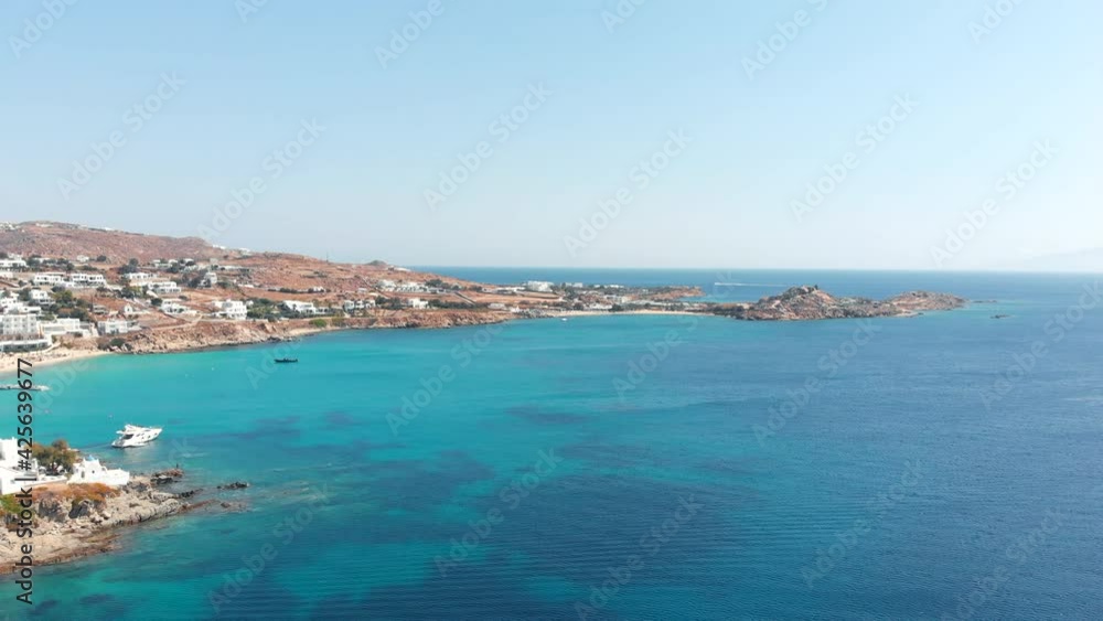 Aerial panoramic rotating view of the famous Platis Gialos Mykonos beach Cyclades Greece. Aerial panoramic rotating view of the famous Platis Gialos Mykonos beach Cyclades Greece.